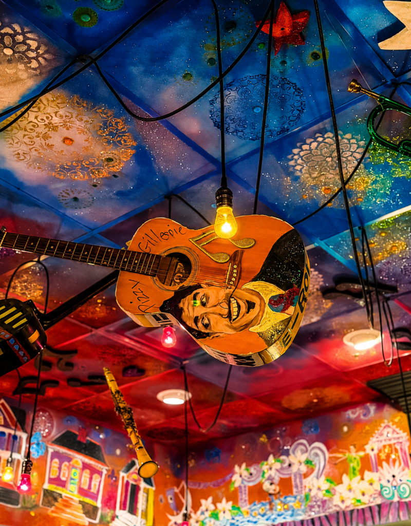 Hand-painted ceiling in the Napoleon Room, with a guitar painted with a musician's portrait