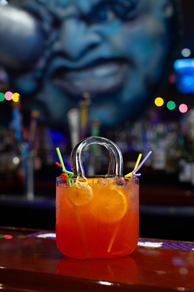 Fleur de Diva, a shareable drink served in a glass purse, at Tibby's Altamonte Springs