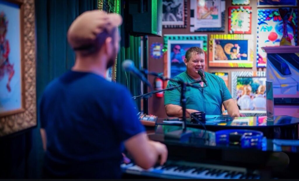 Dueling pianos performing at Sunday brunch, Tibby's Brandon